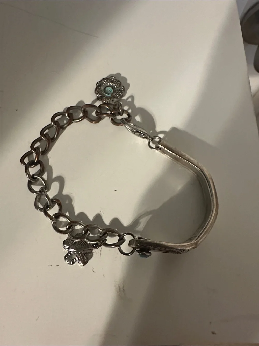 Silver Charm Chain Bracelet with Floral Accents